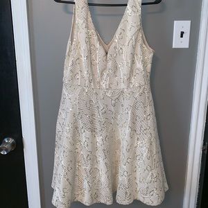 ivory and gold dress perfect for summer occasions
